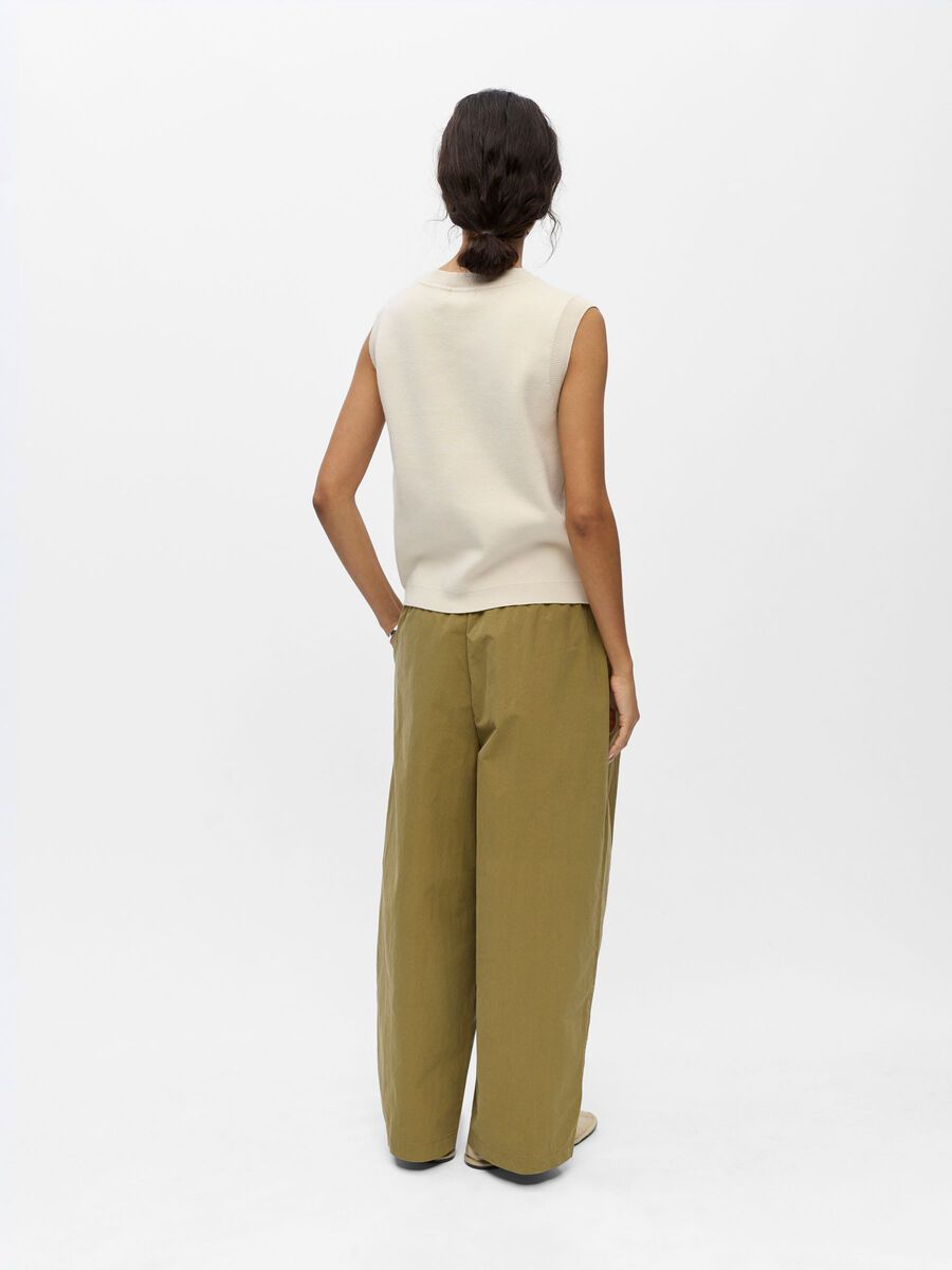 Product carousel image - CUT-OUT KNIT VEST, Birch | 2