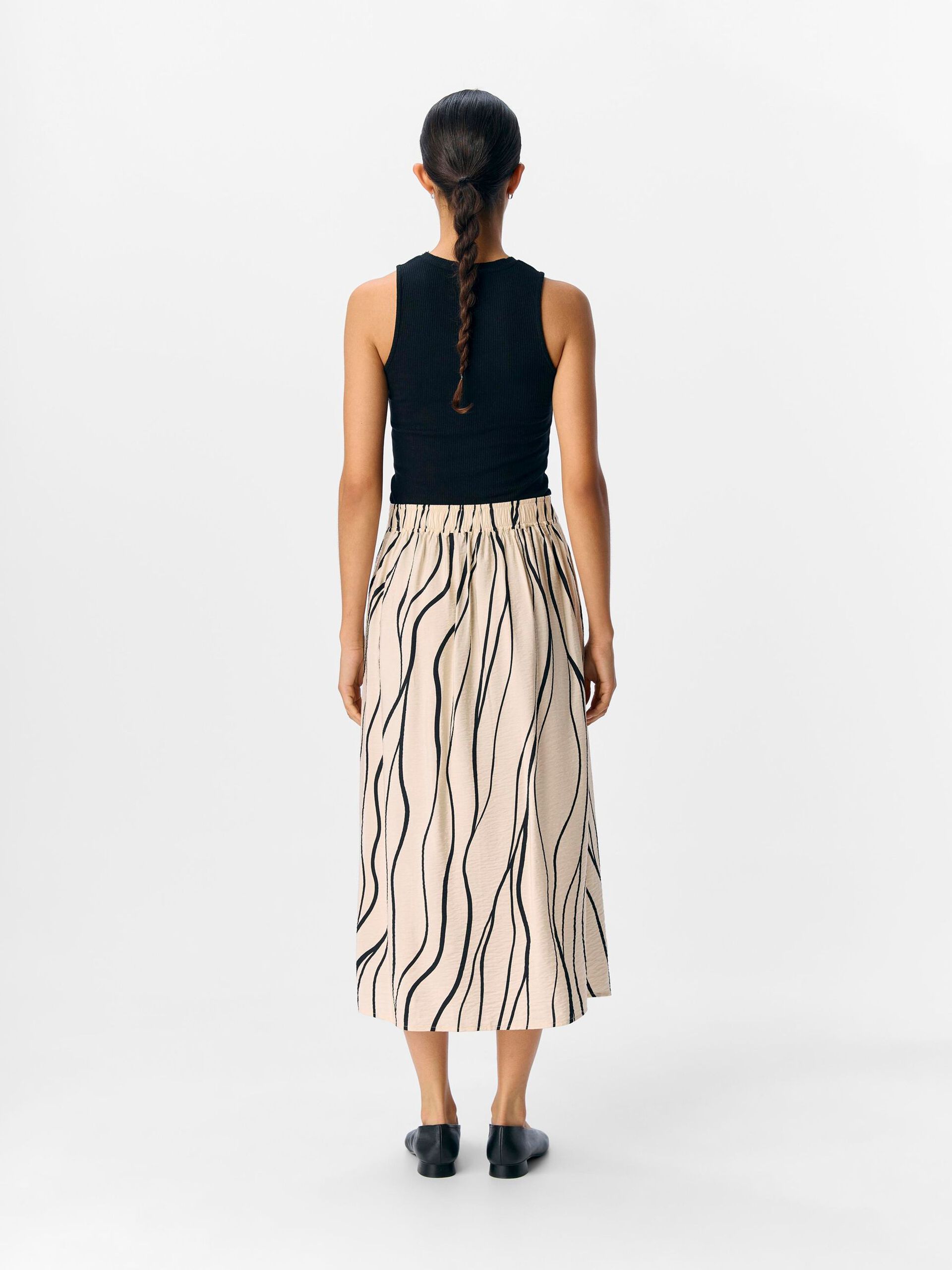 Carousel image - FALDA MIDI, Sandshell | 3